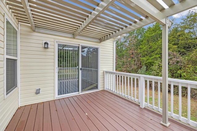 wooden terrace with a pergola