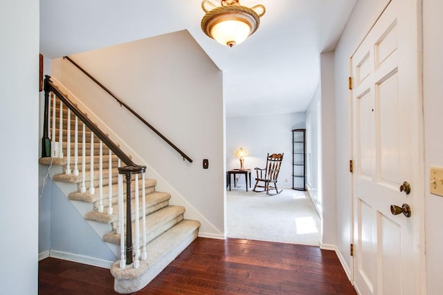 entryway featuring dark wood-type flooring