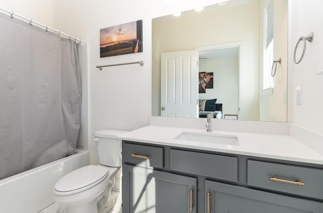 full bathroom with tile patterned flooring, shower / bath combination with curtain, toilet, and vanity