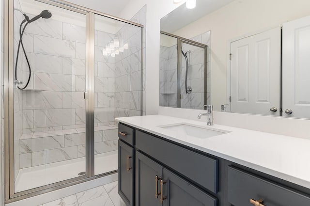 bathroom with vanity and an enclosed shower