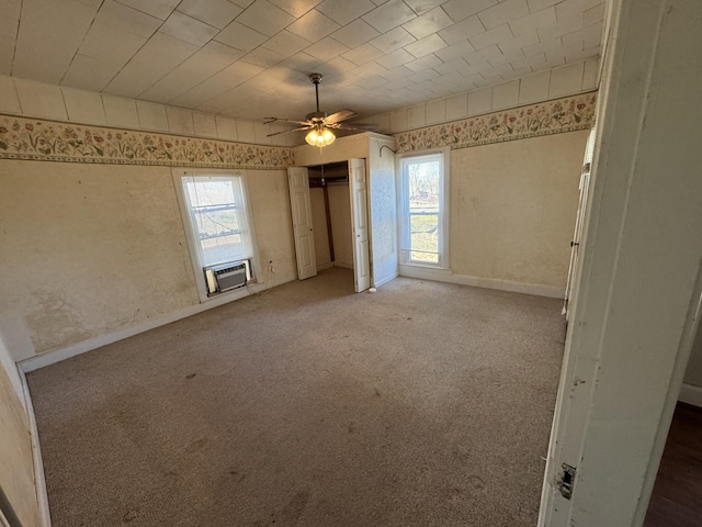 1200 N Church St, Portland, TN 37148 - spare room with carpet floors, a ceiling fan, and cooling unit