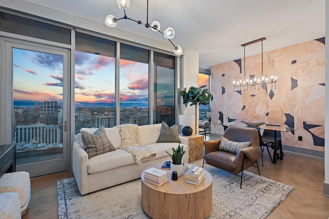 living room featuring hardwood / wood-style floors and an inviting chandelier