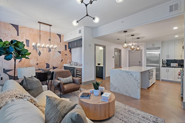 living room with a chandelier