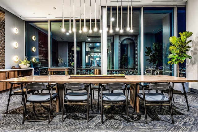 bar with carpet floors and butcher block countertops