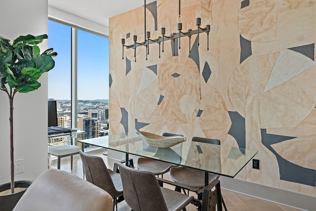 1616 W End Ave Unit 2011, Nashville, TN 37203 - dining area featuring floor to ceiling windows, a view of city, and wood finished floors