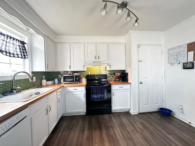 kitchen with wooden counters, white dishwasher, sink, black range with electric cooktop, and white cabinetry