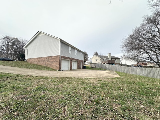 view of yard featuring a garage