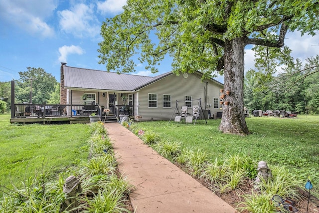 view of front of home with a front yard