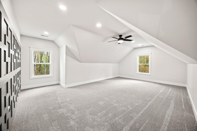 bonus room featuring ceiling fan, lofted ceiling, and carpet floors