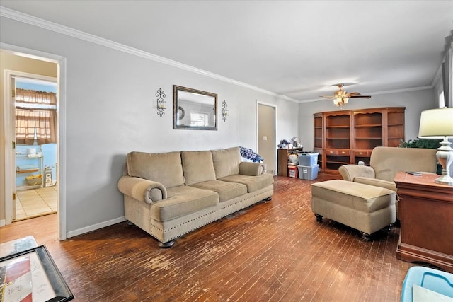 living room with ceiling fan, dark hardwood / wood-style flooring, and ornamental molding