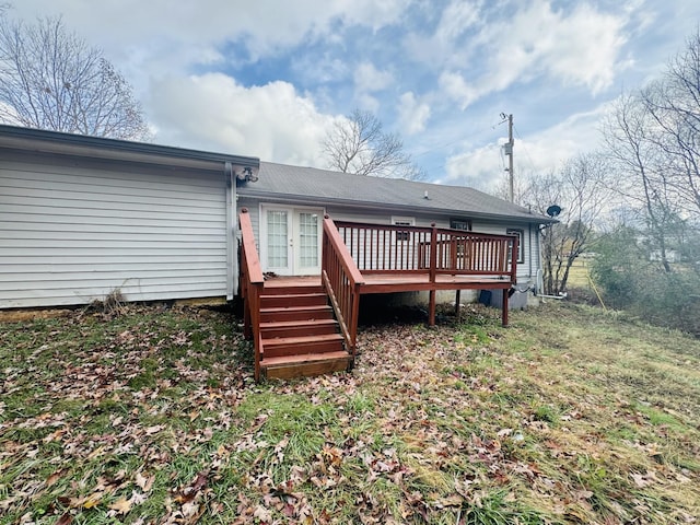 rear view of property with a deck