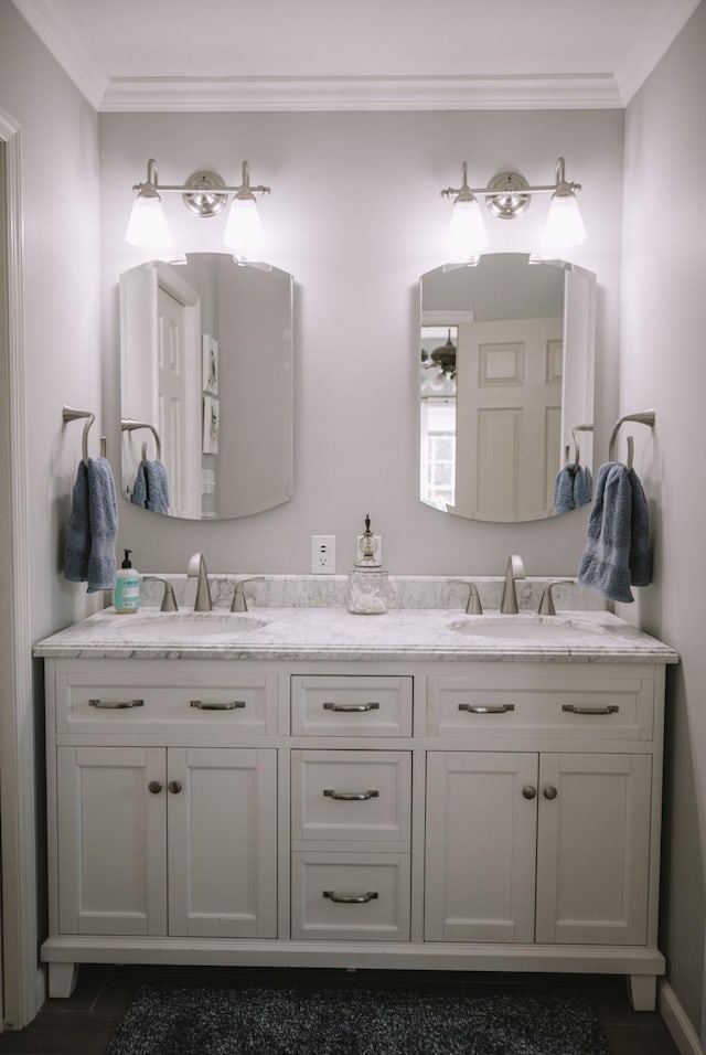 bathroom featuring vanity and ornamental molding