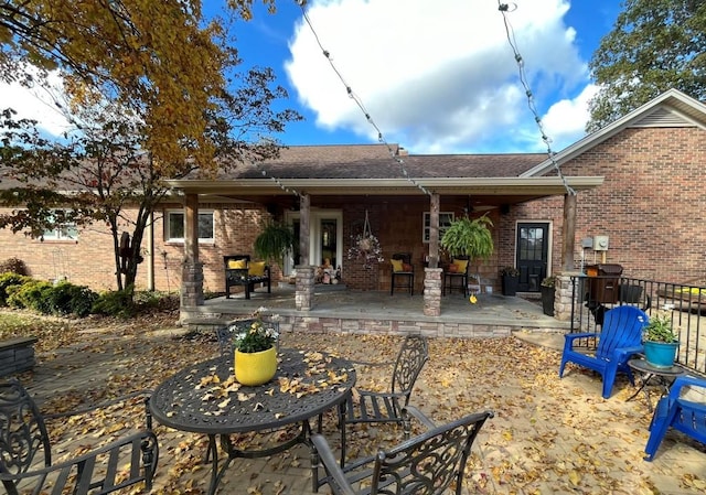 back of house with a patio area