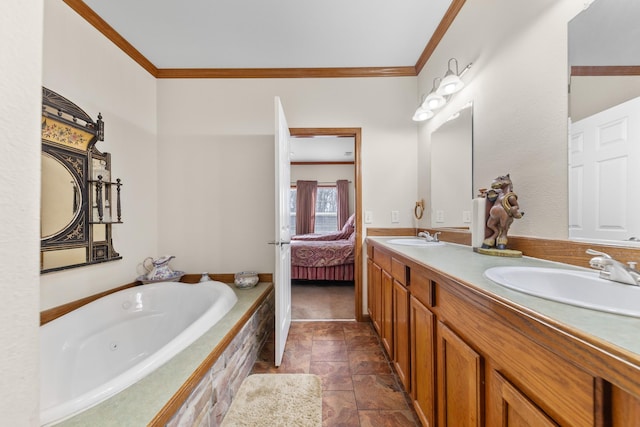 bathroom featuring vanity, crown molding, and tiled tub