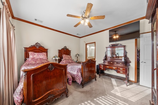 bedroom featuring ceiling fan, crown molding, and light colored carpet