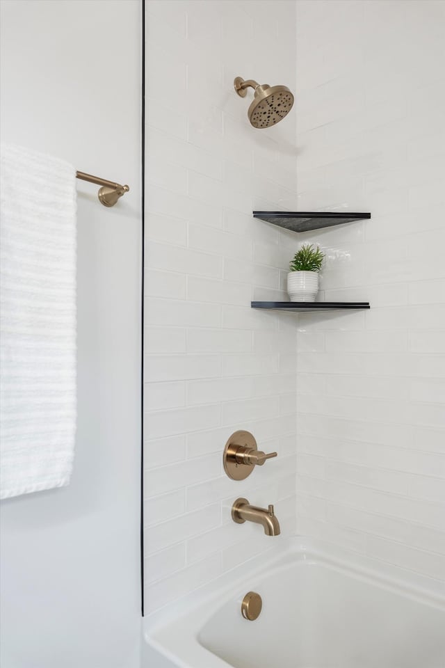 bathroom with shower / bathing tub combination