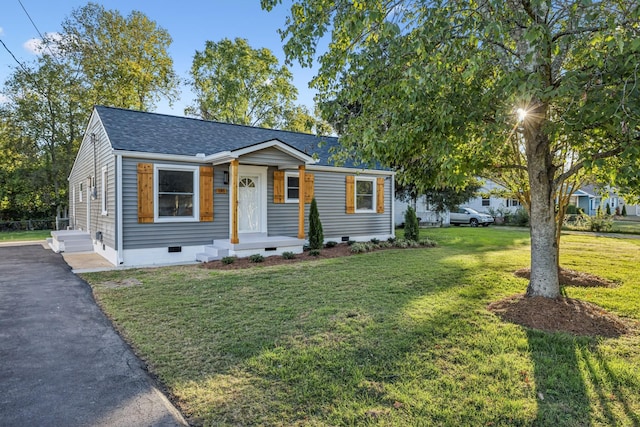 view of front of house with a front lawn