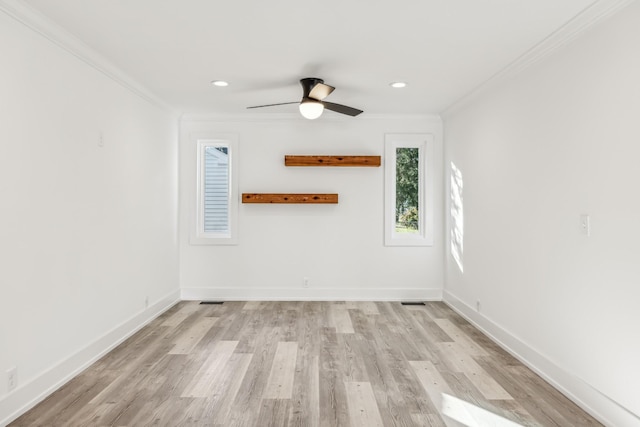 spare room with ceiling fan, light hardwood / wood-style floors, and ornamental molding