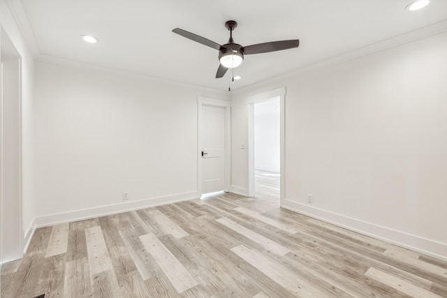 unfurnished room with crown molding, ceiling fan, and light wood-type flooring