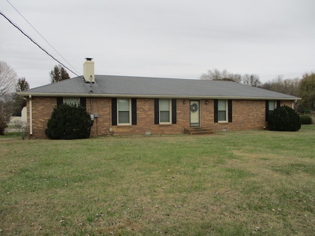 ranch-style house featuring a front yard