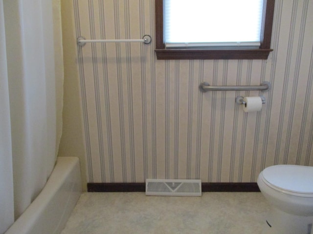 bathroom featuring toilet