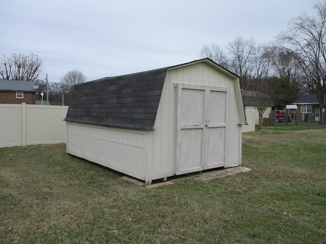 view of outdoor structure with a yard