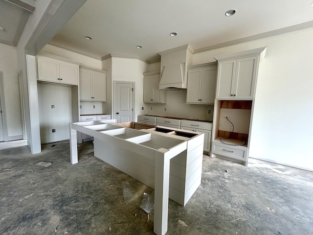 504 Gresham Ln, Murfreesboro, TN 37129 - kitchen with recessed lighting, crown molding, a kitchen island, and premium range hood