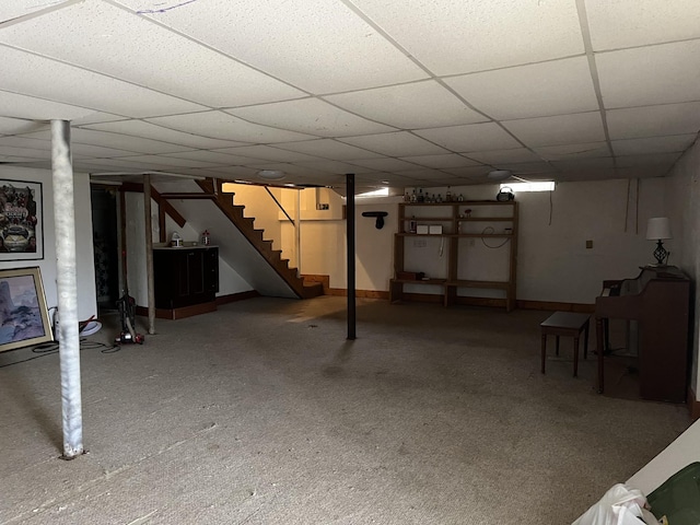 basement featuring a drop ceiling