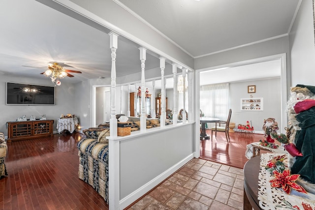 living room with hardwood / wood-style floors, ceiling fan, and ornamental molding