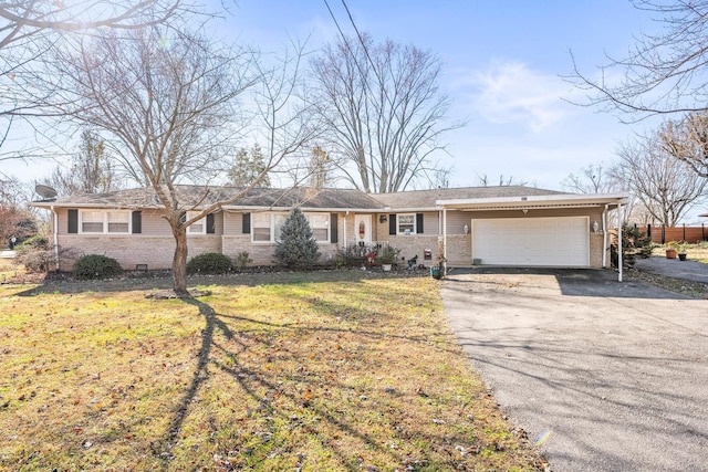 single story home with a garage and a front yard