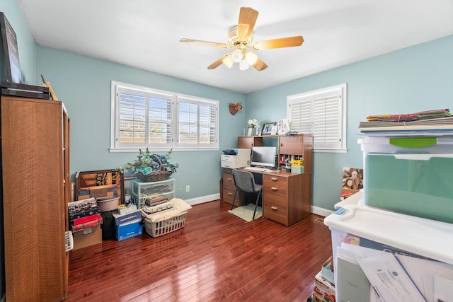 office space featuring ceiling fan and dark hardwood / wood-style flooring