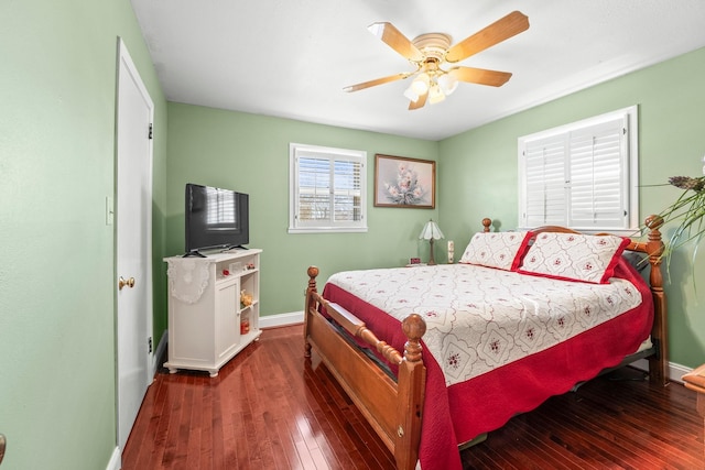 bedroom featuring ceiling fan and dark hardwood / wood-style floors