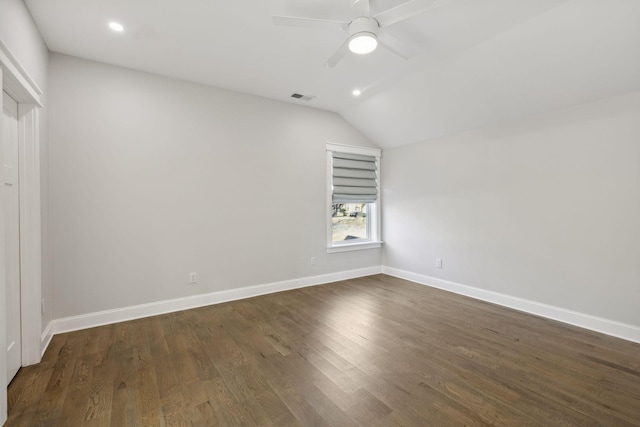 interior space with dark hardwood / wood-style flooring, ceiling fan, and lofted ceiling