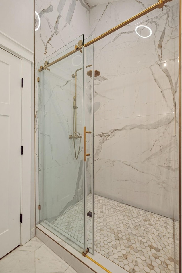 bathroom featuring an enclosed shower