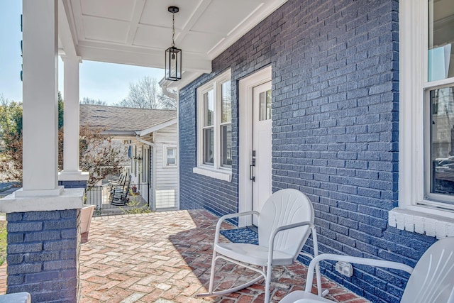 view of patio featuring a porch