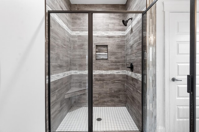 bathroom with a stall shower