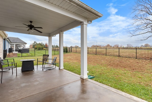 view of patio with ceiling fan and a fenced backyard