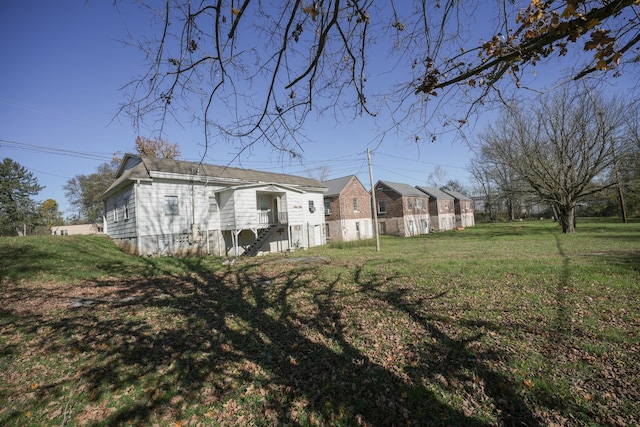 exterior space featuring a yard