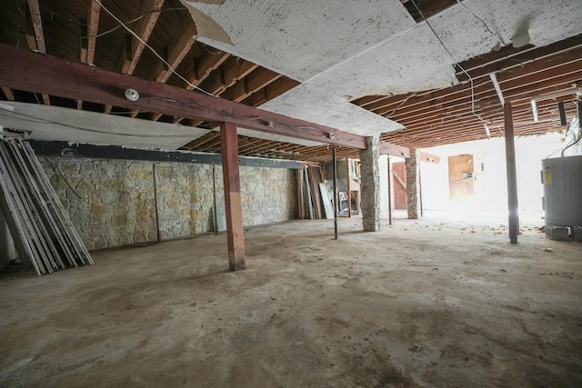 basement featuring water heater