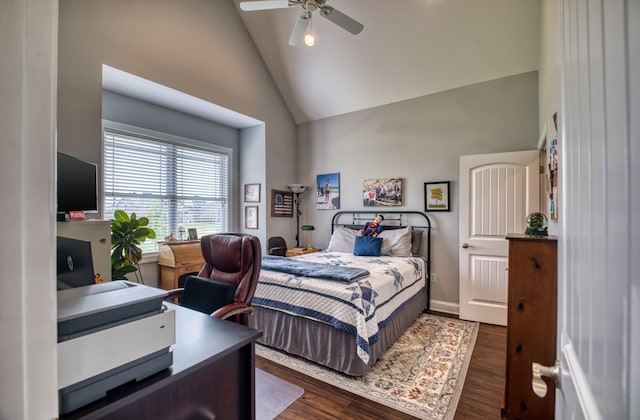 bedroom with ceiling fan, dark hardwood / wood-style flooring, and high vaulted ceiling