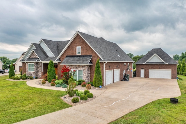 view of front of property featuring a garage and a front lawn