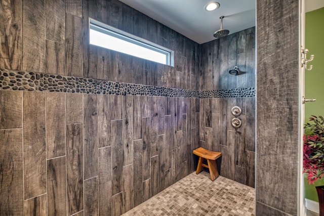 bathroom with tiled shower