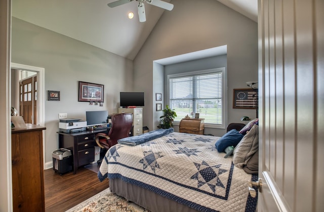 bedroom featuring ceiling fan, dark hardwood / wood-style flooring, and high vaulted ceiling