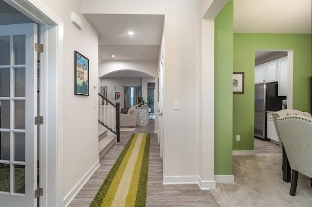 hallway featuring light wood-type flooring