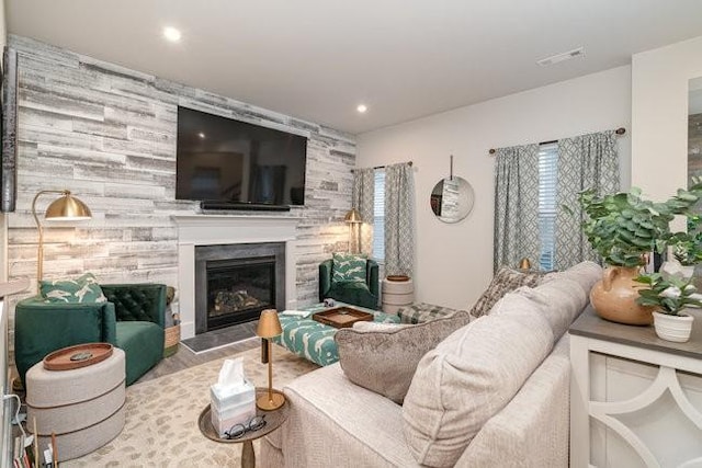 living room with light hardwood / wood-style floors and a wealth of natural light