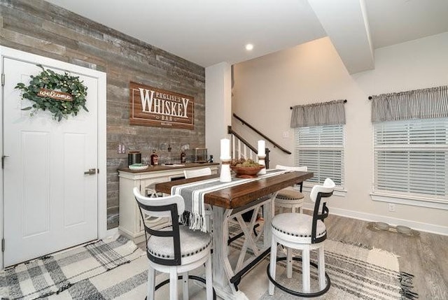 bar featuring light wood-type flooring