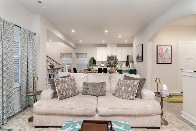 living room with light hardwood / wood-style floors