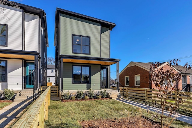 view of front of house with a front lawn