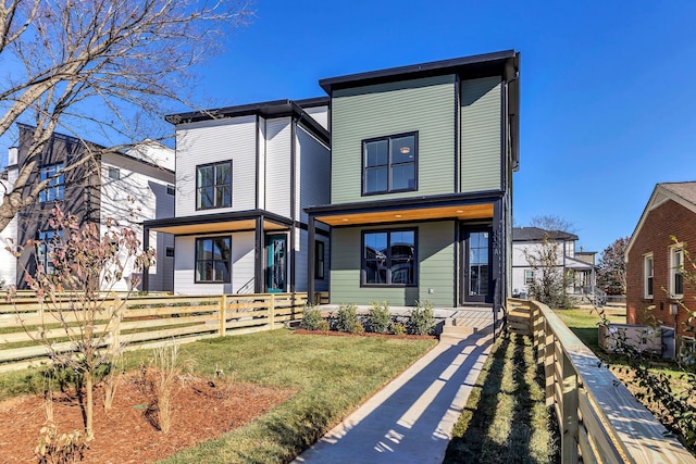 modern home with a front yard