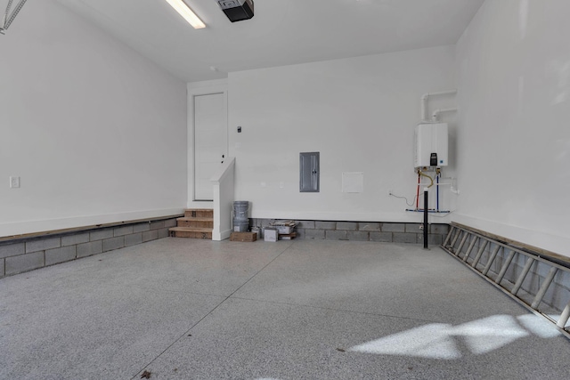 garage featuring electric panel, tankless water heater, and a garage door opener